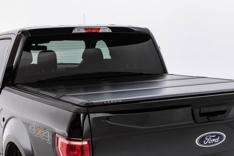 Load image into Gallery viewer, Ford F-150 Leer Black Hard Folding Tonneau Cover for 2004 to 2025
