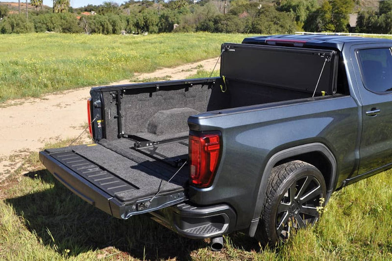 Load image into Gallery viewer, Ford F-150 Leer Black Hard Folding Tonneau Cover for 2015 to 2025
